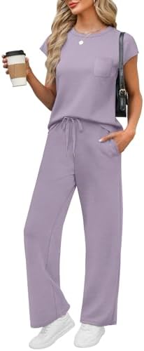 Draped in rich purple spacer knit, this two-piece set pairs a cap sleeve crewneck top with relaxed wide leg trousers.