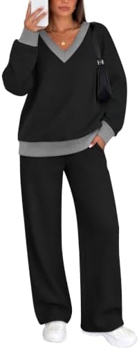 Two tones of heathered black grey meet in a soft knit set built with a ribbed v-neck and relaxed wide-leg pants.