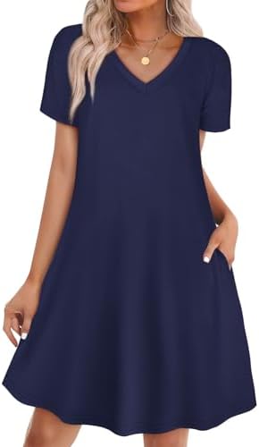 A deep navy blue tshirt dress cut with short sleeves, a classic V-neck, and two deep side pockets for sunny days.