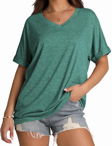 A deep blue green shade sets a relaxed tone on this oversized tee, finished with rolled sleeves and a neat V-neckline.
