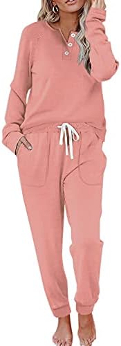 Coral pink brings a warm blush tone to this soft fleece set, pairing a buttoned henley with relaxed drawstring sweatpants.