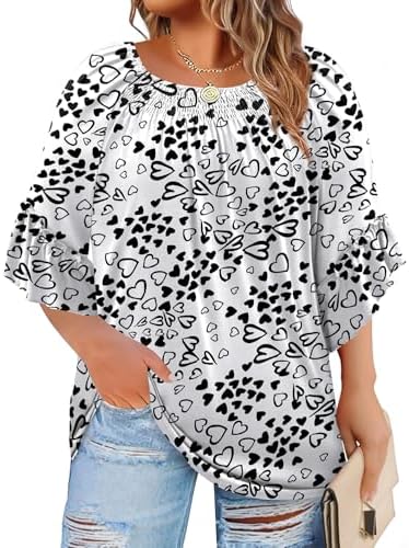Soft smocking rings the round neckline of this boho top, matched with airy three-quarter sleeves that finish in gentle ruffle cuffs.