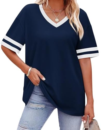 A relaxed navy tee cut with striped cuff accents and a cool, airy drape for warm afternoons.