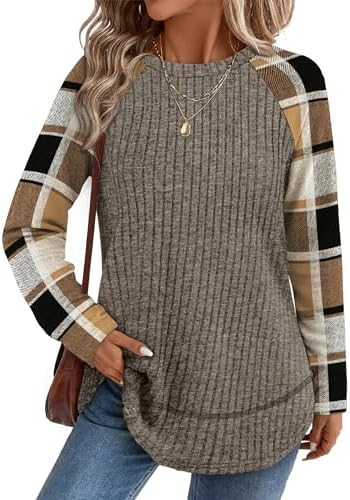 A curved high-low hem and earth-toned coffee plaid print make this soft long sleeve tunic an easy match for your favorite leggings.