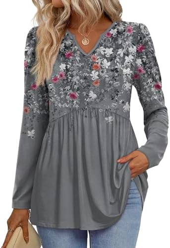 Gathered babydoll tiers flare out beneath an open V-neckline in this soft long-sleeve floral grey top.