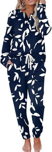Soft thermal fleece forms a two-piece lounge set with a henley button top and drawstring pants printed in navy floral.