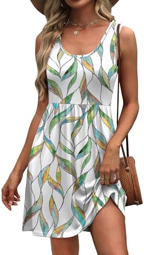 A lush leaf motif covers this sleeveless summer sundress, cut with deep side pockets and a breezy high-waisted swing.