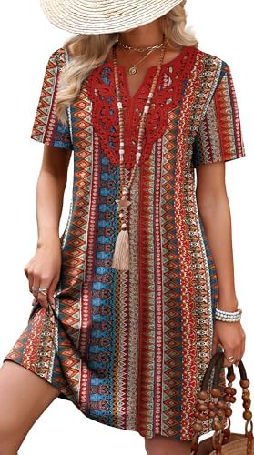 Intricate lace traces the neckline of this easy t-shirt dress, cut in a vibrant ethnic floral print that packs flat for travel.