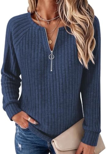 A crisp blue ribbed knit pullover with a quarter zip neckline and easy raglan sleeves for cool mornings and office days.