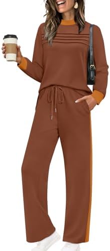 A spacer knit two-piece set featuring a pleated long sleeve top with side slits and cropped wide-leg pants.