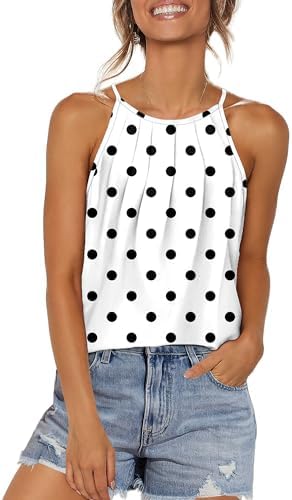 Delicate polka dots scatter across this pleated halter tank cut with an airy curved hem for warm afternoons.