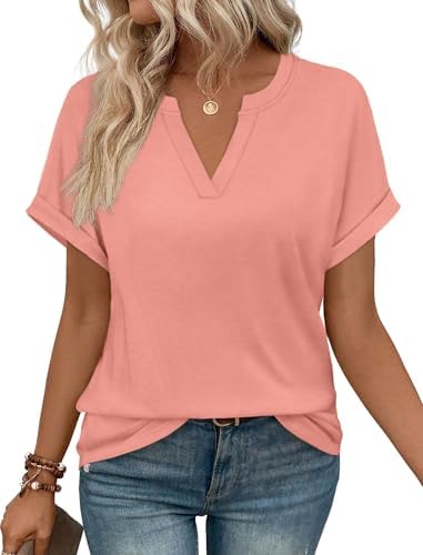 A bright coral knit with neat rolled sleeves and a classic V-neckline gives this loose summer top an easy sunny feel.
