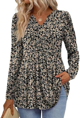 Soft blossoms scatter across a deep black base on this roomy babydoll blouse, finished with relaxed long puff sleeves.