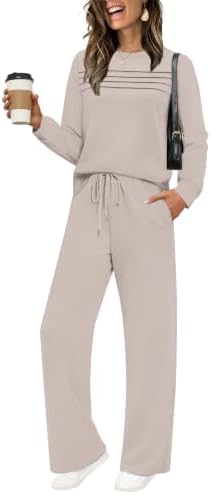 Soft khaki knit pairs a pleated crewneck top with wide leg sweatpants for easy travel days and relaxed weekends.