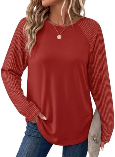 A vivid red lightweight knit pullover with textured raglan sleeves and a relaxed tunic hem designed for easy layering.
