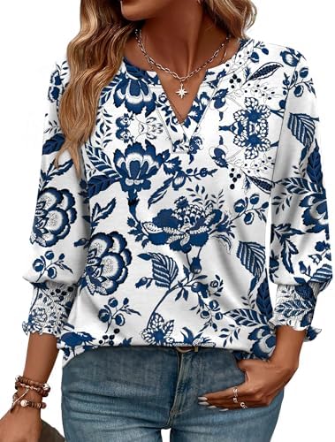 Cut with three-quarter sleeves and a neat V-neckline, this floral blouse drapes loosely through the body in lightweight fabric.