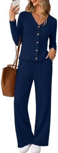 Deep navy ribbed knit pairs a button-front V-neck cardigan with high-waist flare pants for easy travel days and relaxed dinners.