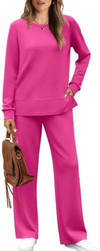 Bright hot pink knit shapes this two-piece set featuring a relaxed crewneck top with side slits and roomy wide-leg pants.