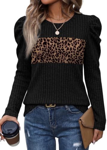 Bold leopard print blocks across dark black panels bring character to this airy, loose-cut crewneck tunic.