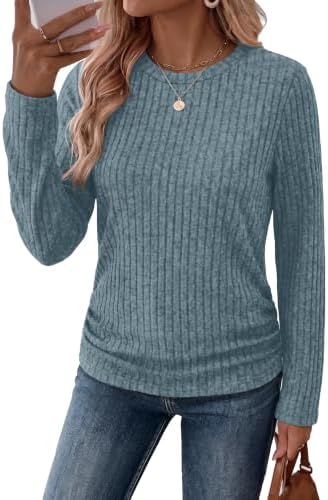 Side shirring gathers this grey blue ribbed knit tunic for an easy shape that layers neatly under jackets when weather cools.