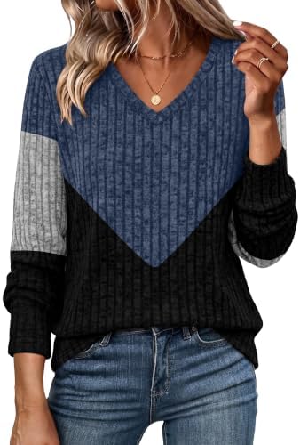 Ribbed lightweight knit meets a blue and black color block split, cut with a relaxed V-neck and an easy, longer tunic hemline.