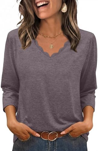 A softly curved scalloped neckline and elbow sleeves shape this lightweight knit top in muted mocha grey purple.