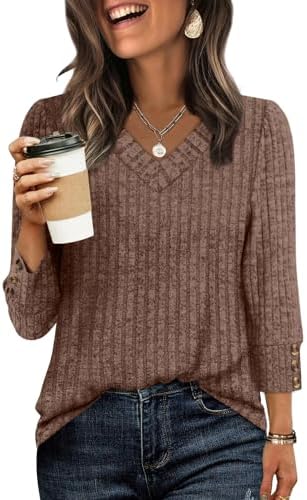 A rich brown knit tunic with a classic V-neck, cut long through the body to pair cleanly over leggings or denim.