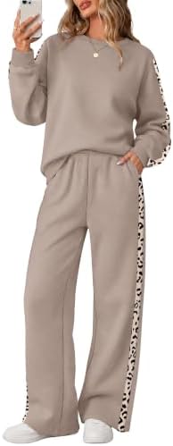 A brushed fleece pullover pairs with matching wide leg pants trimmed in contrast side stripes for easy fall layering.
