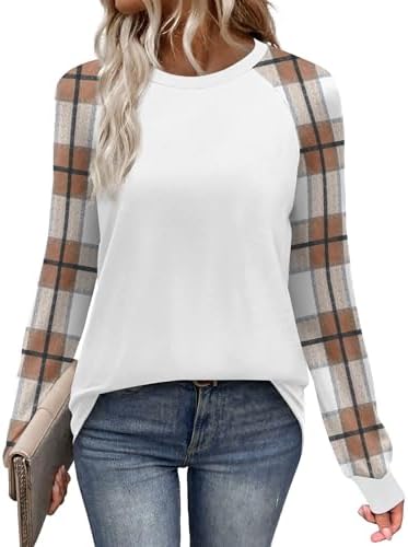 A relaxed crewneck top with contrast beige plaid raglan sleeves that balance warm neutral tones with soft everyday stretch.