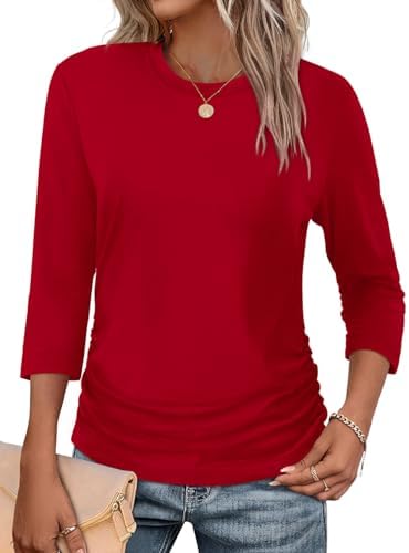 A rich red knit cut with three-quarter sleeves and gathered side ruching gives this tunic an easy drape over jeans or skirts.