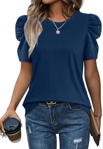 A crisp blue tunic top cut with structured leg-of-mutton puff sleeves and a classic round neck for warm afternoons.