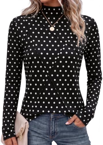 A micro black polka dot pattern adds playful texture to this close-fitting long sleeve mock neck knit top.