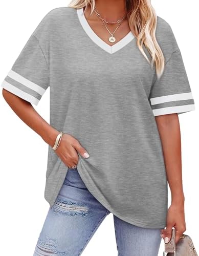 Heather grey knit pairs with striped sleeve cuffs on a relaxed V-neck tunic cut with generous length through the body.