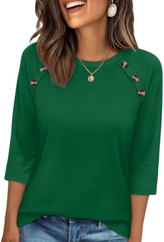 Rich dark green fabric pairs with three-quarter sleeves and subtle button accents for an easy, breezy daytime silhouette.