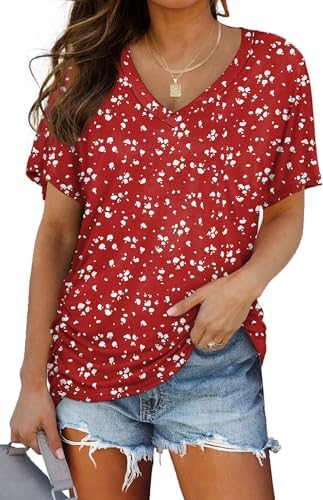 A spotted red knit top cut with easy short sleeves, side shirring, and a soft V-neckline for sunny afternoons.