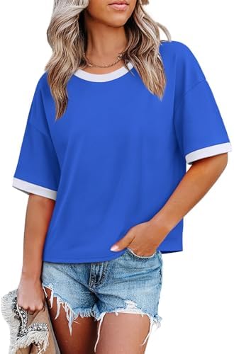 A vivid royal blue tee with dropped shoulders, color-block edges, and a roomier half-sleeve cut for easy warm-weather wear.