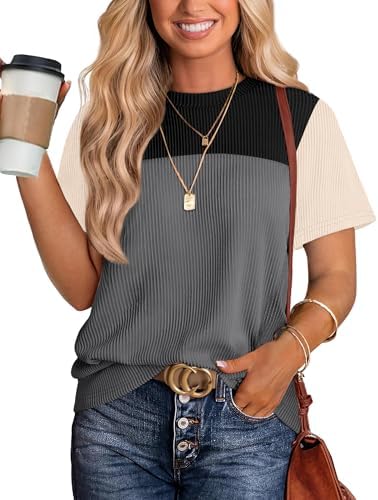Cool gray and deep black color blocking brings a sharp graphic look to this ribbed short sleeve summer knit.