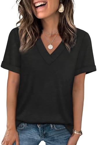 A crisp black tee cut with a neat V-neck and rolled cuffs, ready to tuck into light denim or tailored trousers.