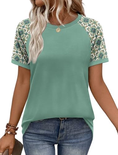 Raglan short sleeves meet soft light green graphic knit for an easy summer top that pairs with denim shorts or skirts.