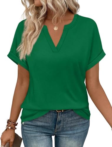 A deep forest green short sleeve blouse with cuffed sleeves and a clean V-neckline designed for easy travel and relaxed days.
