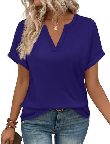 A deep dark blue knit with rolled sleeves and a neat V-neckline gives this tunic-length summer top an easy everyday drape.