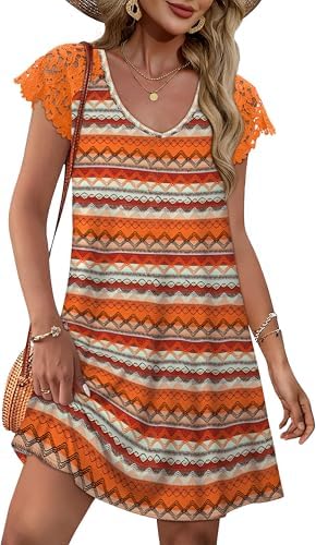 Geometric rhombus patterning meets airy lace short sleeves on this breezy swing mini cut for sunny days and travel itineraries.