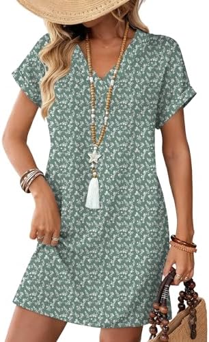 A relaxed green floral tee dress with cuffed sleeves and roomy side pockets, ready for warm beach days and outdoor brunches.