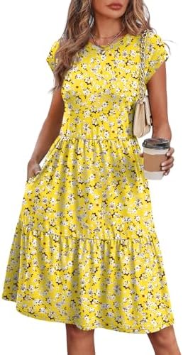 Splashed in cheerful yellow and white, this tiered knee-length dress features breezy cap sleeves and deep side pockets.