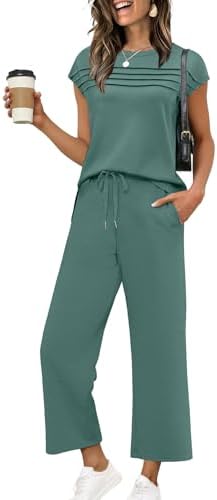 Rich teal spacer knit pairs a pleated cap-sleeve top with wide-leg cropped pants for easy resort and airport days.