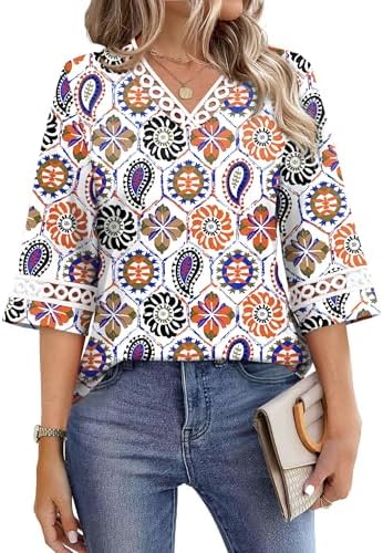 Fine paisley swirls across this airy top, finished with soft eyelet lace along the open neckline and sleeve edges.