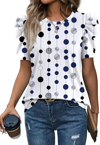 Crisp white polka dots bring cheerful detail to this breathable crewneck top cut with softly structured short puff sleeves.
