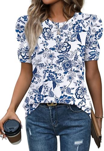 Delicate white blossoms drift across our cool blue knit top, finished with soft round gathers along the upper sleeves.