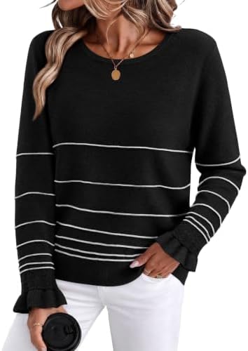 Crisp black and white stripes meet subtle ribbed texture and ruffled wrists on this soft, lightweight fall pullover.
