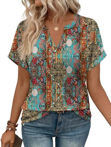 Bright botanical petals cover this breezy V-neck tunic, finished with neat rolled cuffs for warm travel days.
